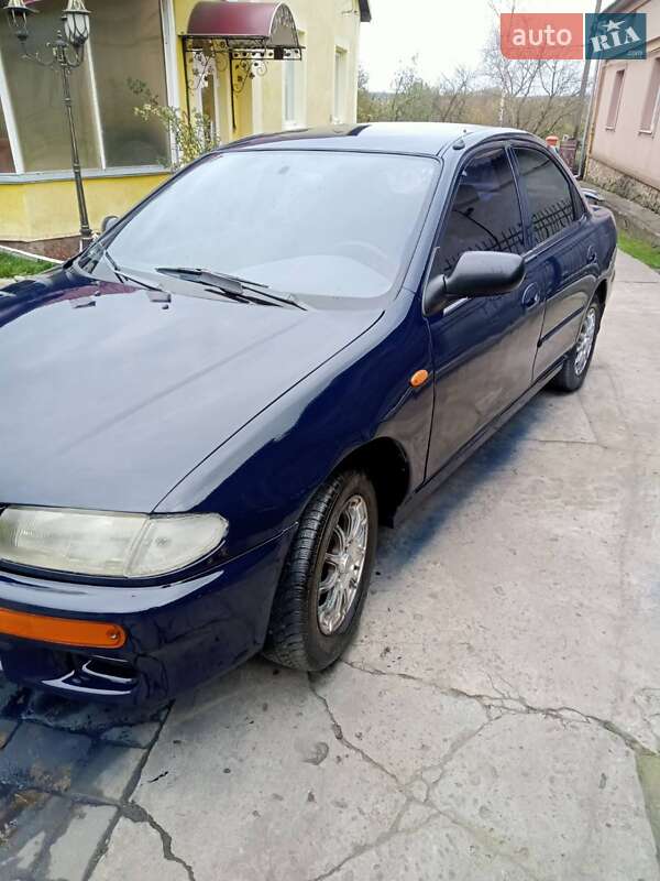Седан Mazda 323 1997 в Шептицькому фото 2 Седан Mazda 323 1997 в Шептицькому