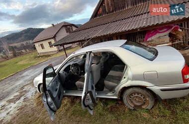 Седан Mazda 323 2000 в 