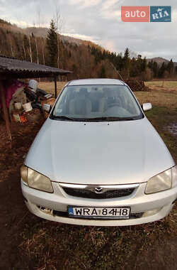 Седан Mazda 323 2000 в 