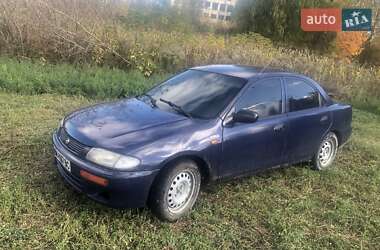 Седан Mazda 323 1996 в 
