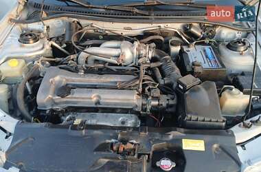 Седан Mazda 323 1996 в 
