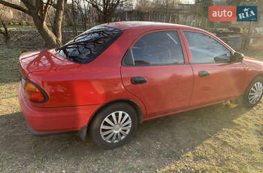 Седан Mazda 323 1997 в 