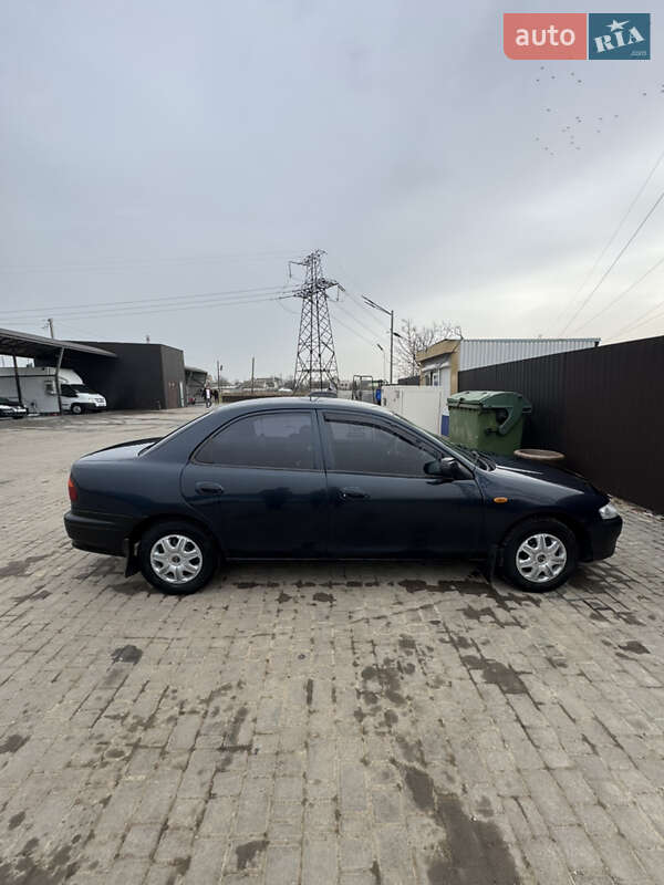 Седан Mazda 323 1997 в Одессе фото 15 Седан Mazda 323 1997 в Одессе
