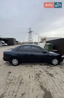 Седан Mazda 323 1997 в 
