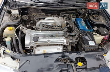 Седан Mazda 323 1997 в 