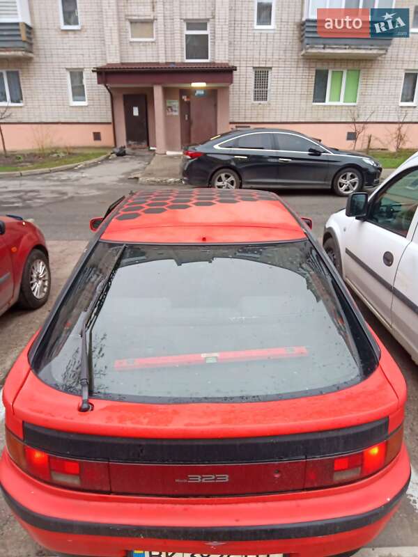 Седан Mazda 323 1991 в Вараші фото 5 Седан Mazda 323 1991 в Вараші