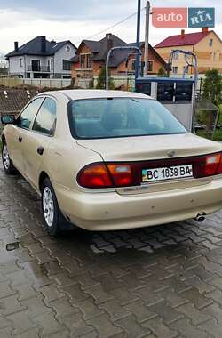 Седан Mazda 323 1996 в 