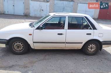 Седан Mazda 323 1989 в 