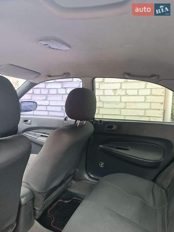 Седан Mazda 323 1997 в Шептицькому фото 14 Седан Mazda 323 1997 в Шептицькому