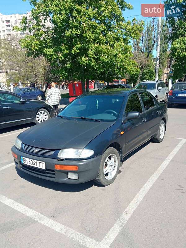 Mazda 323, фото з оголошення