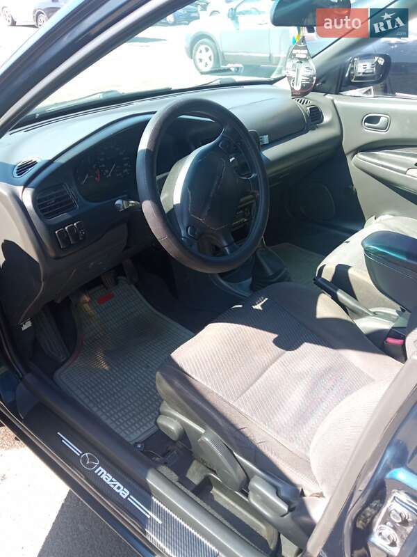 Седан Mazda 323 1994 в Одесі фото 4 Седан Mazda 323 1994 в Одесі