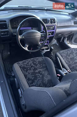 Хэтчбек Mazda 323 1998 в 