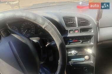 Хэтчбек Mazda 323 1996 в 