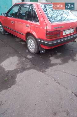 Хетчбек Mazda 323 1987 в 