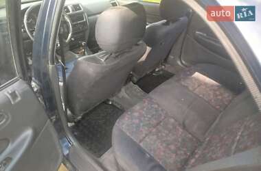 Седан Mazda 323 1997 в 