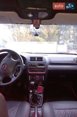 Хэтчбек Mazda 323 1998 в 