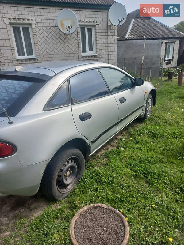 Хетчбек Mazda 323 1996 в Бурині фото 3 Хетчбек Mazda 323 1996 в Бурині