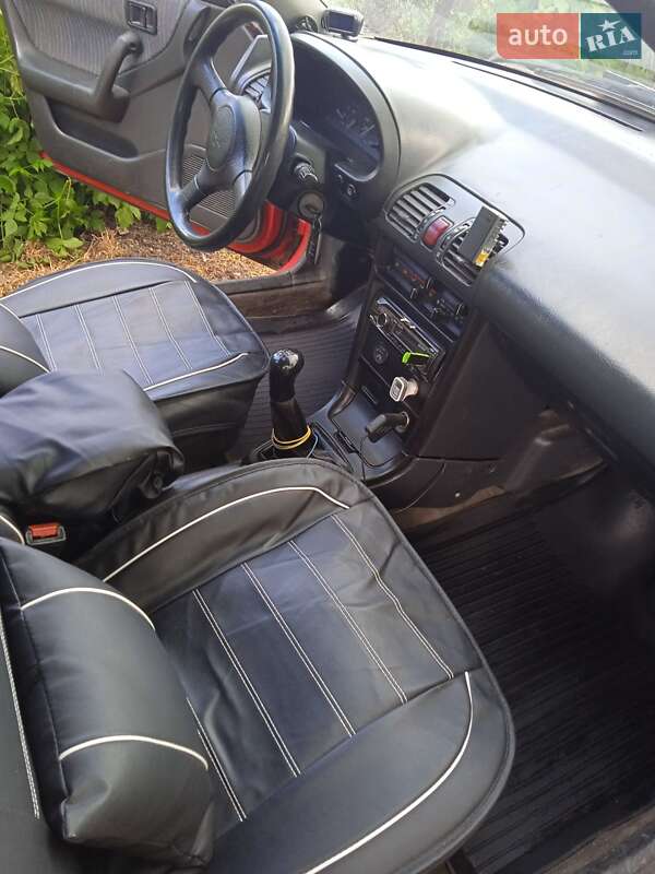 Хэтчбек Mazda 323 1994 в Кременчуге фото 7 Хэтчбек Mazda 323 1994 в Кременчуге