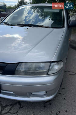 Седан Mazda 323 1998 в 