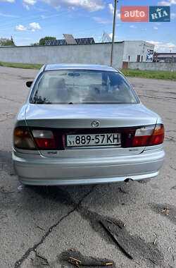 Седан Mazda 323 1998 в 