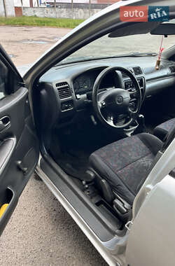Седан Mazda 323 1998 в 