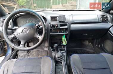 Хетчбек Mazda 323 1996 в 