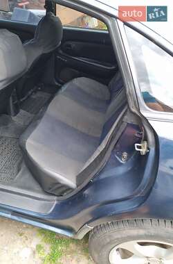 Хетчбек Mazda 323 1996 в 