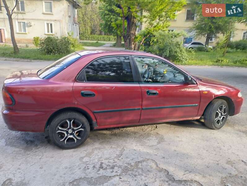 Седан Mazda 323 1996 в Запоріжжі фото 5 Седан Mazda 323 1996 в Запоріжжі