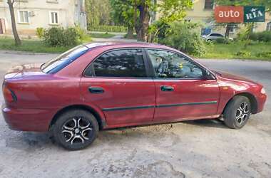 Седан Mazda 323 1996 в 