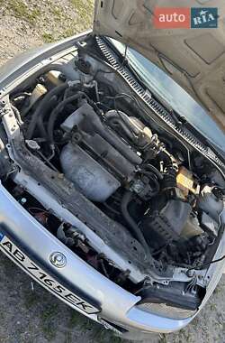 Хэтчбек Mazda 323 1997 в 