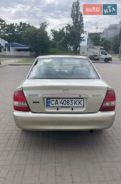 Седан Mazda 323 1998 в 