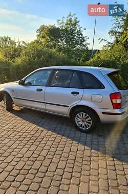 Хэтчбек Mazda 323 1999 в 