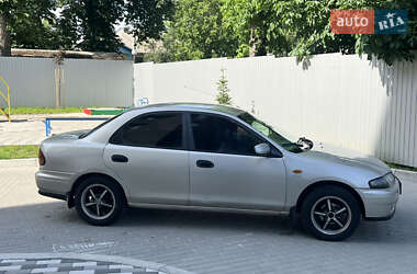Седан Mazda 323 1998 в 