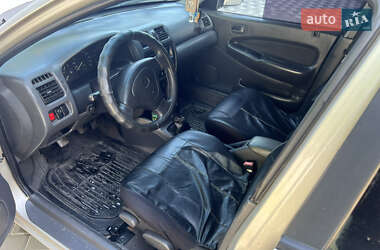 Седан Mazda 323 1998 в 