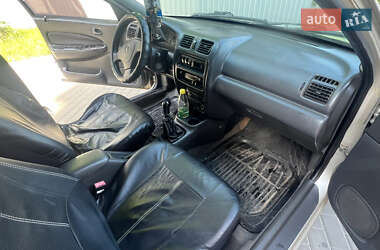 Седан Mazda 323 1998 в 