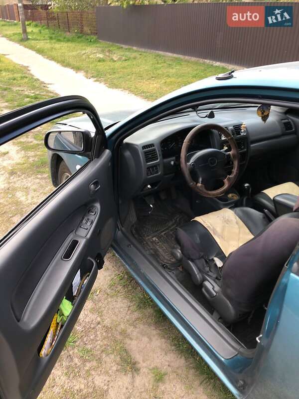 Хэтчбек Mazda 323 1997 в Киеве фото 11 Хэтчбек Mazda 323 1997 в Киеве