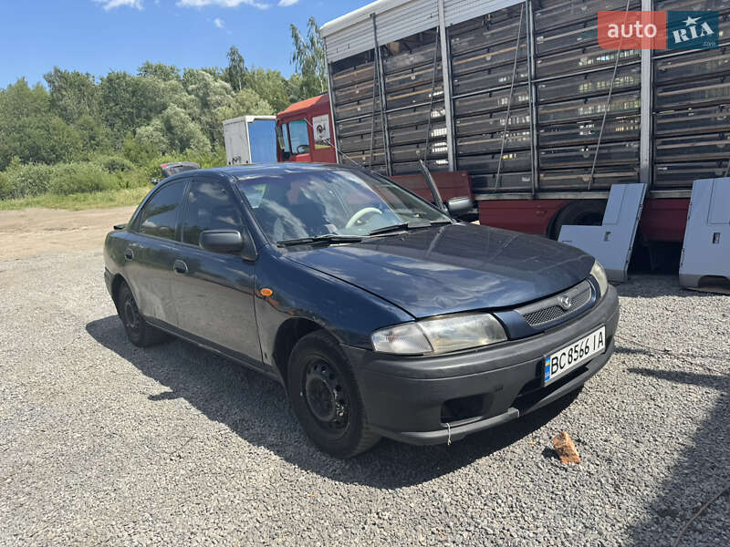 Седан Mazda 323 1998 в 