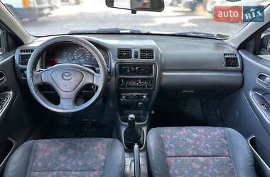 Седан Mazda 323 1998 в 