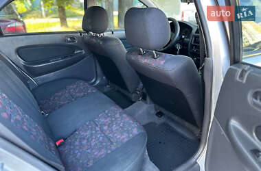 Седан Mazda 323 1998 в 
