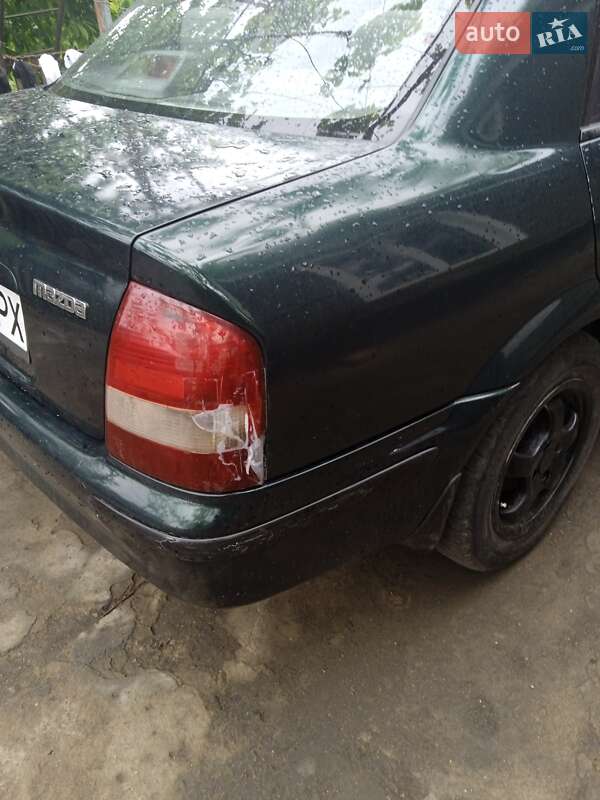 Седан Mazda 323 1998 в Подольске фото 3 Седан Mazda 323 1998 в Подольске