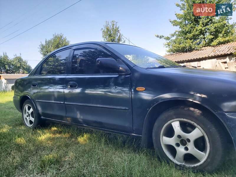 Седан Mazda 323 1995 в Хмельницком фото 5 Седан Mazda 323 1995 в Хмельницком