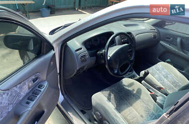 Седан Mazda 323 1998 в 