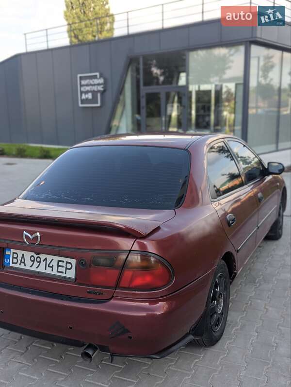 Седан Mazda 323 1996 в Кропивницькому фото 4 Седан Mazda 323 1996 в Кропивницькому