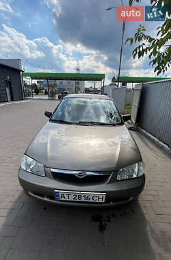 Седан Mazda 323 1999 в 