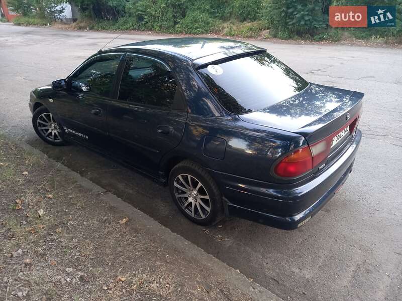 Седан Mazda 323 1997 в Запоріжжі