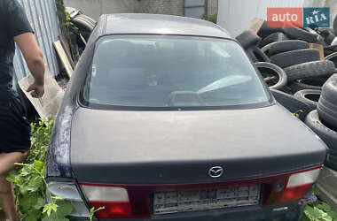 Седан Mazda 323 1998 в 