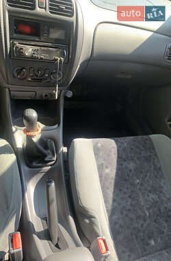 Хетчбек Mazda 323 1999 в 
