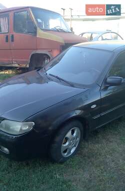 Хэтчбек Mazda 323 2000 в 