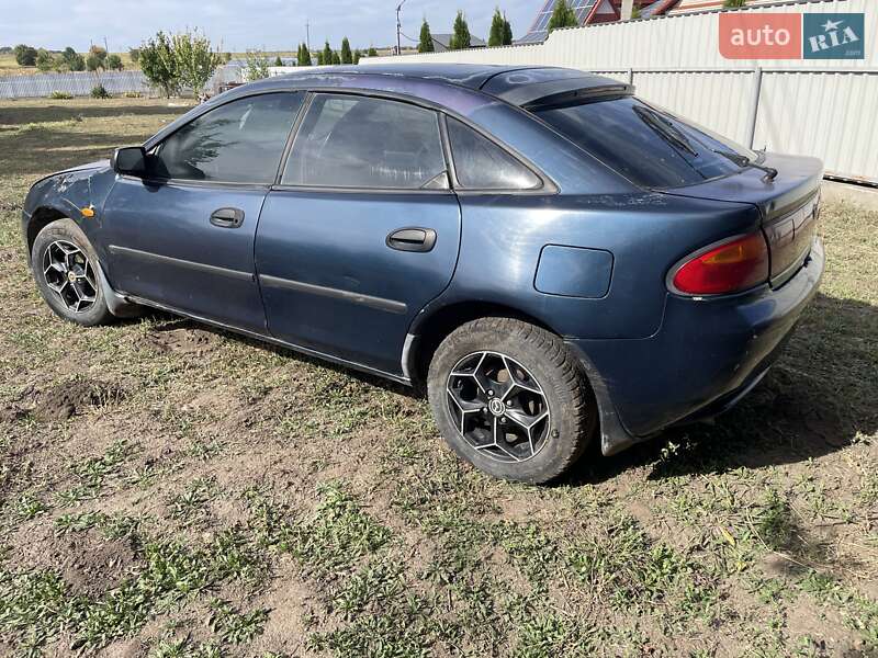 Хетчбек Mazda 323 1997 в Корсунь-Шевченківському фото 2 Хетчбек Mazda 323 1997 в Корсунь-Шевченківському