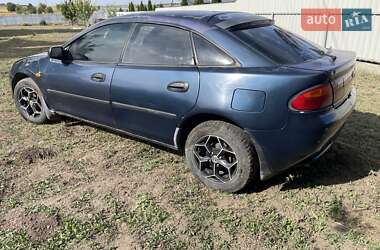 Хэтчбек Mazda 323 1997 в 